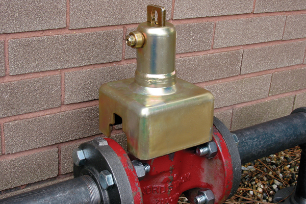 The Cowbell Lock is a formidable opponent to tampering attempts on large volume industrial lubricated plug valves.