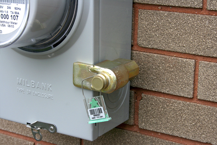 The Fort Knox is the most secure ringless meter locking device available (shown with Plastic Sealing Cap and Clearseal).