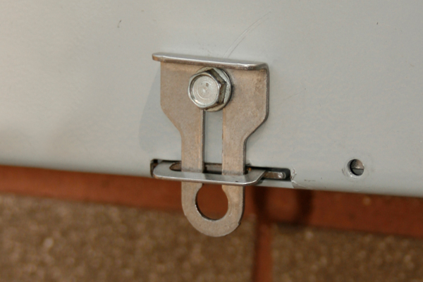 The Replacement Seal Hasp with keyhole slot is designed to be mounted on the socket cover using a retaining screw. Once installed, the Seal Hasp slides up and down allowing for cover removal.